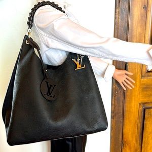 Louis Vuitton purse Carmel perforated calf leather black with brown handle